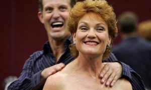 australia entertainer mckenney pretends to strangle former australian political firebrand pauline hanson in sydney photo reuters